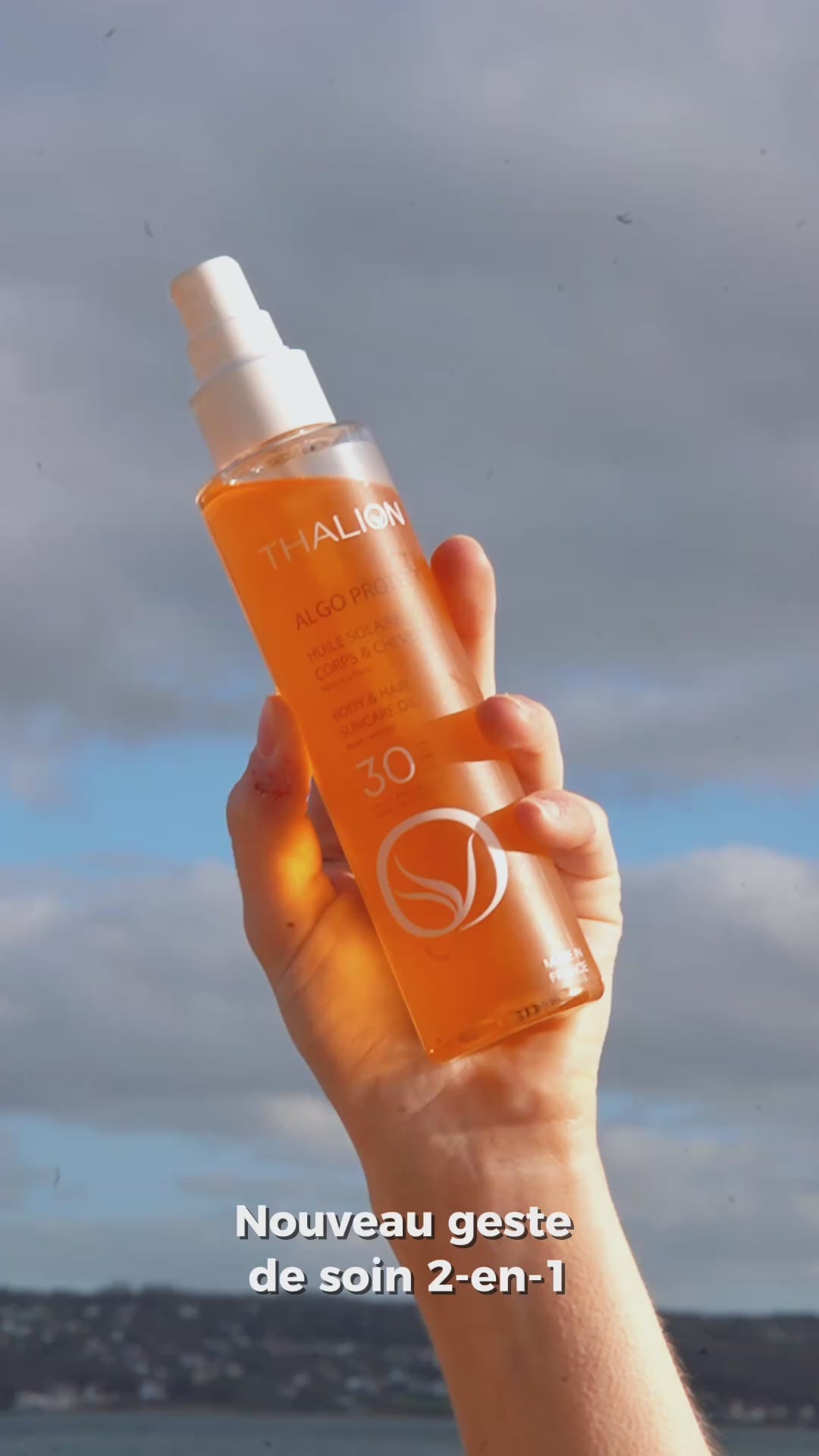 Load video: Huile solaire corps et cheveux SPF30 Thalion